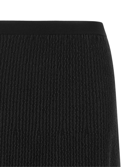 Skirt by Elisabetta Franchi for women in polyamide polyester viscose black & patterned showcases a sultry silhouette, elegantly defined by its midi and the sophisticated sultry design of the Flow Women's Pleated Polyamide Polyester Viscose Skirt.