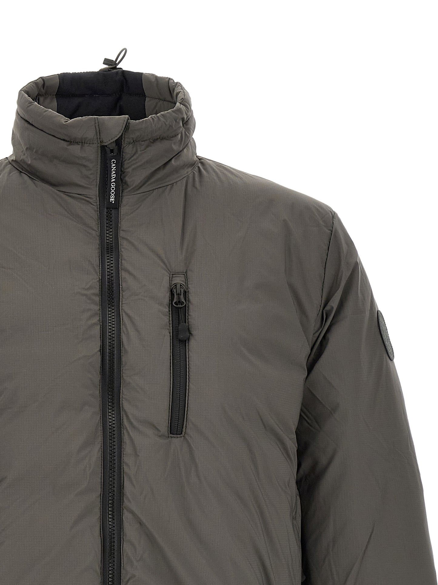 Overcoat by Canada Goose for men in polyamide bicolour, green & olive features a cosy chic silhouette, artfully detailed with a sophisticated and premium thermal, pockets & insulated for a cosy chic finish.