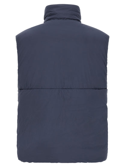 Vest by Canada Goose for men in polyamide black & dark-blue showcases a utilitarian silhouette, artfully incorporating and a utilitarian high-neck neckline for a truly utilitarian finish.