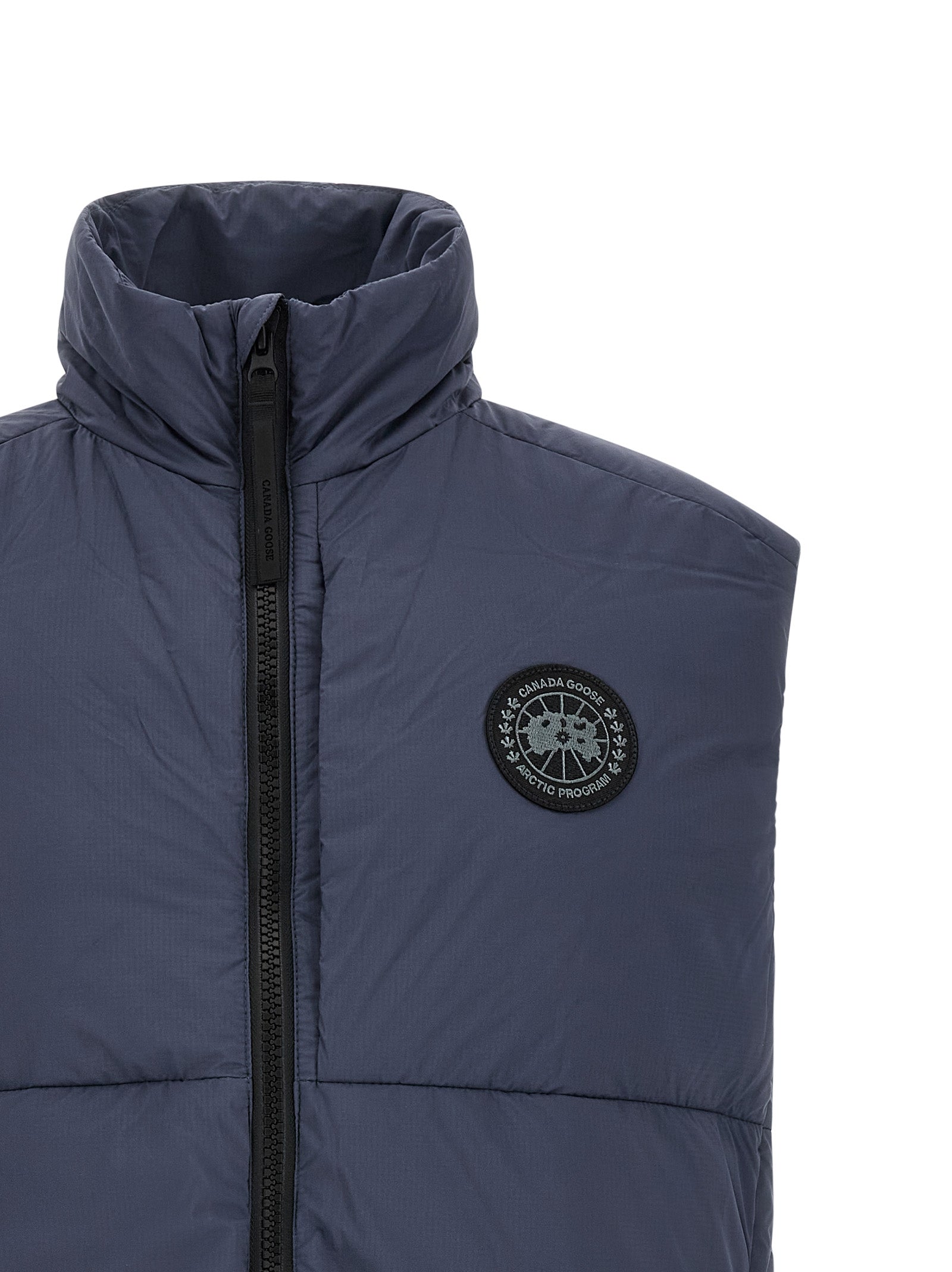 Vest by Canada Goose for men in polyamide black & dark-blue features a stylish silhouette, showcasing distinct and a refined high-neck neckline for a truly stylish finish.