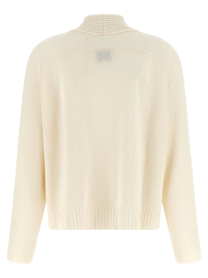 Cardigan by Loulou De Saison for women in cashmere ivory & white features an crisp silhouette, showcasing a sophisticated v-neck neckline and detail for a truly crisp finish.