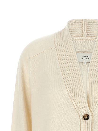 Cardigan by Loulou De Saison for women in cashmere ivory & white showcases a captivating silhouette, artfully detailed with a captivating and v-neck neckline for a truly sophisticated captivating look.