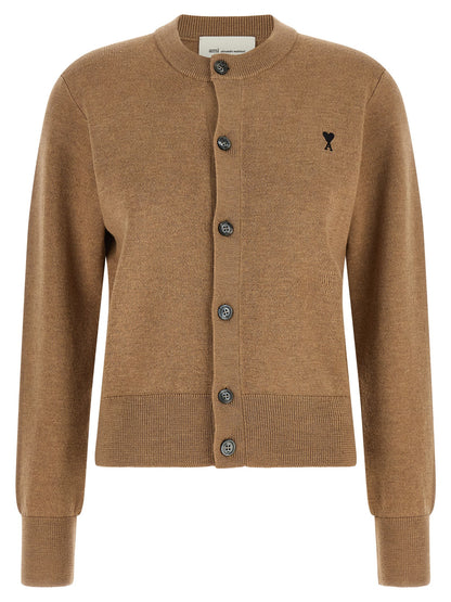 Cardigan by Ami Paris for women in wool beige, camel & horn showcases a luxurious silhouette, meticulously detailed with a sophisticated crew neckline and for a refined finish.