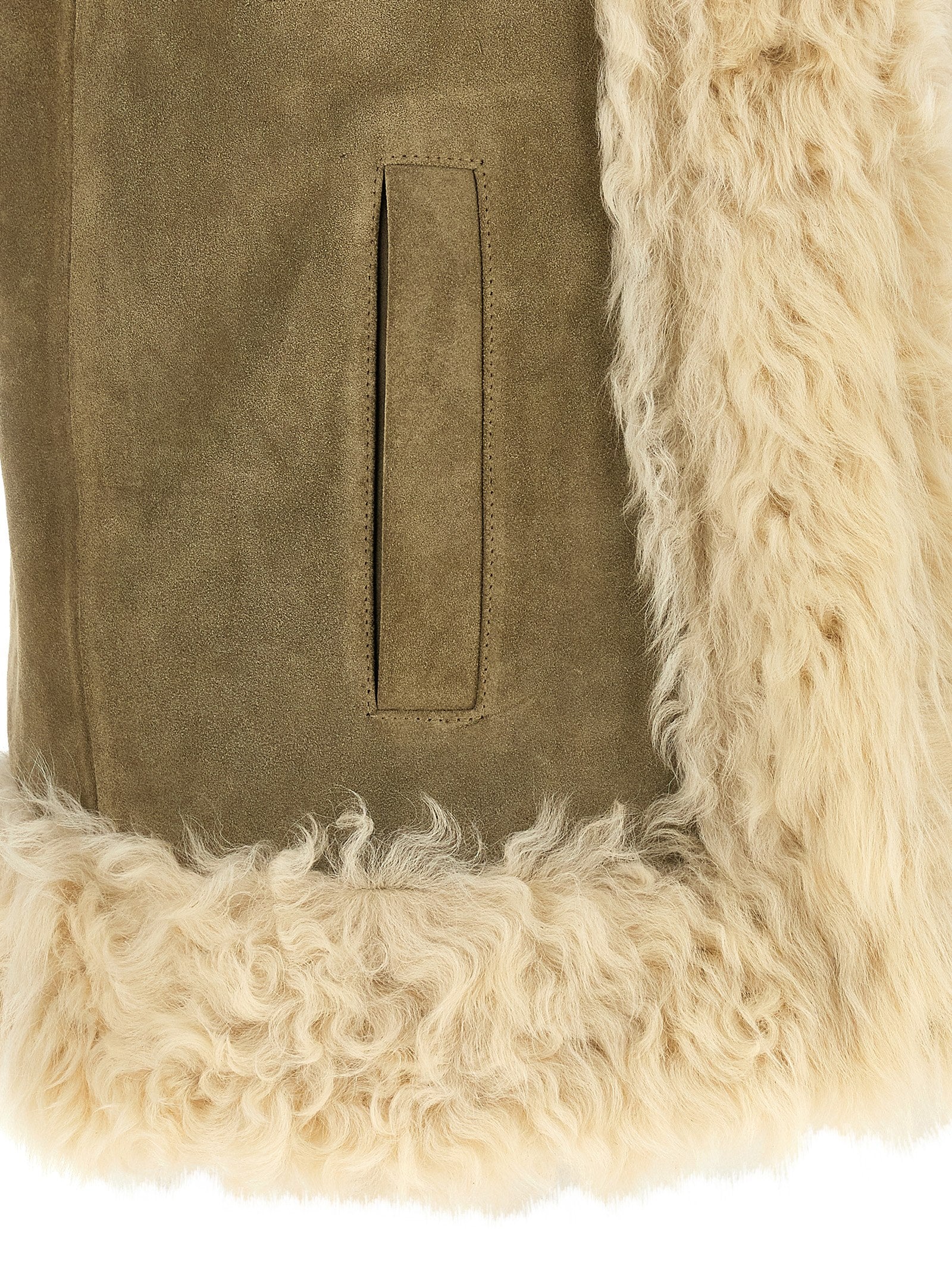 Vest by Etro for women in suede lamb leather & shearling beige, cream, olive & paisley showcases a utilitarian silhouette, artfully incorporating pockets and a utilitarian for a truly utilitarian finish.