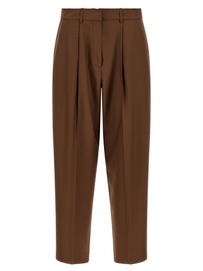 Casual Pants by Gianluca Capannolo for women in wool beige presents a refined pantology silhouette, artfully defined by a refined pantology tapered-leg, long, and a sophisticated high rise.