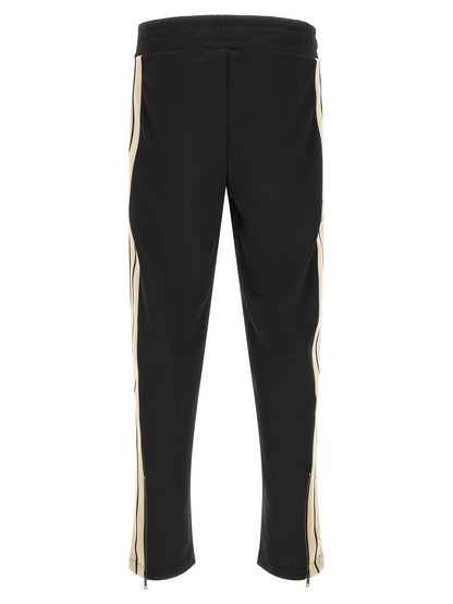 Track Pants by Palm Angels for men in polyester bicolour, beige, black, white & signature features an contemporary straight-leg with a long and , showcasing for a contemporary finish.