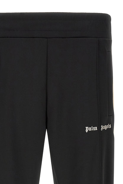 Track Pants by Palm Angels for men in polyester bicolour, beige, black, white & signature features a versatile straight-leg and long cut with a comfortable , showcasing innovative .