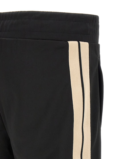 Track Pants by Palm Angels for men in polyester bicolour, beige, black, white & signature features an sporty straight-leg with a long and , expertly finished with for an sporty look.