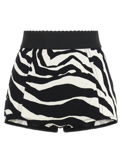 Bermuda Shorts by Dolce & Gabbana for women in stretch polyamide cotton bicolour, black, white, zebra & print presents a sleek silhouette, featuring a sleek wide with a refined short and a sophisticated high rise.