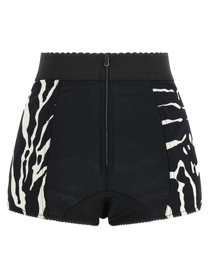 Bermuda Shorts by Dolce & Gabbana for women in stretch polyamide cotton bicolour, black, white, zebra & print features an tailored silhouette, showcasing a tailored wide with a short and high rise for a sophisticated look.