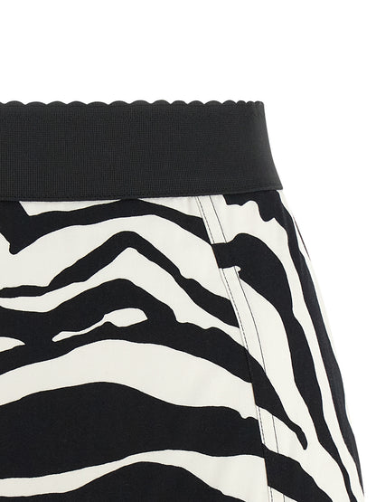 Bermuda Shorts by Dolce & Gabbana for women in stretch polyamide cotton bicolour, black, white, zebra & print features a eye catching wide and short with a eye catching high rise.
