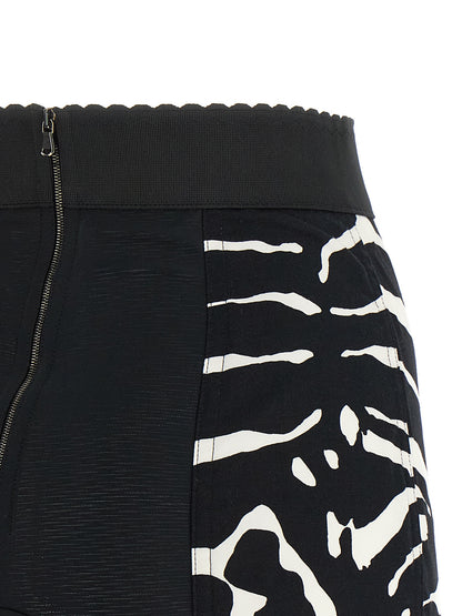 Bermuda Shorts by Dolce & Gabbana for women in stretch polyamide cotton bicolour, black, white, zebra & print features an nuanced silhouette, showcasing a nuanced wide with a short cut and high rise for a sophisticated, premium finish.