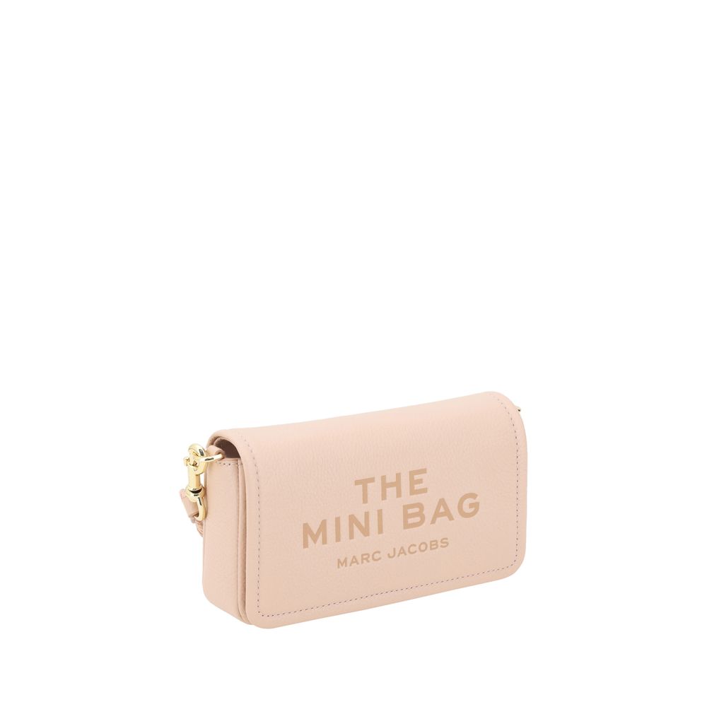 Mini Shoulder Flap Bag by Marc Jacobs for women in bos taurus calf grained leather multicolor & monogram features a enviable silhouette, showcasing a secure flap, magnetic & button, ample single-compartment, and enviable shoulder-strap & adjustable-strap for a enviable finish.
