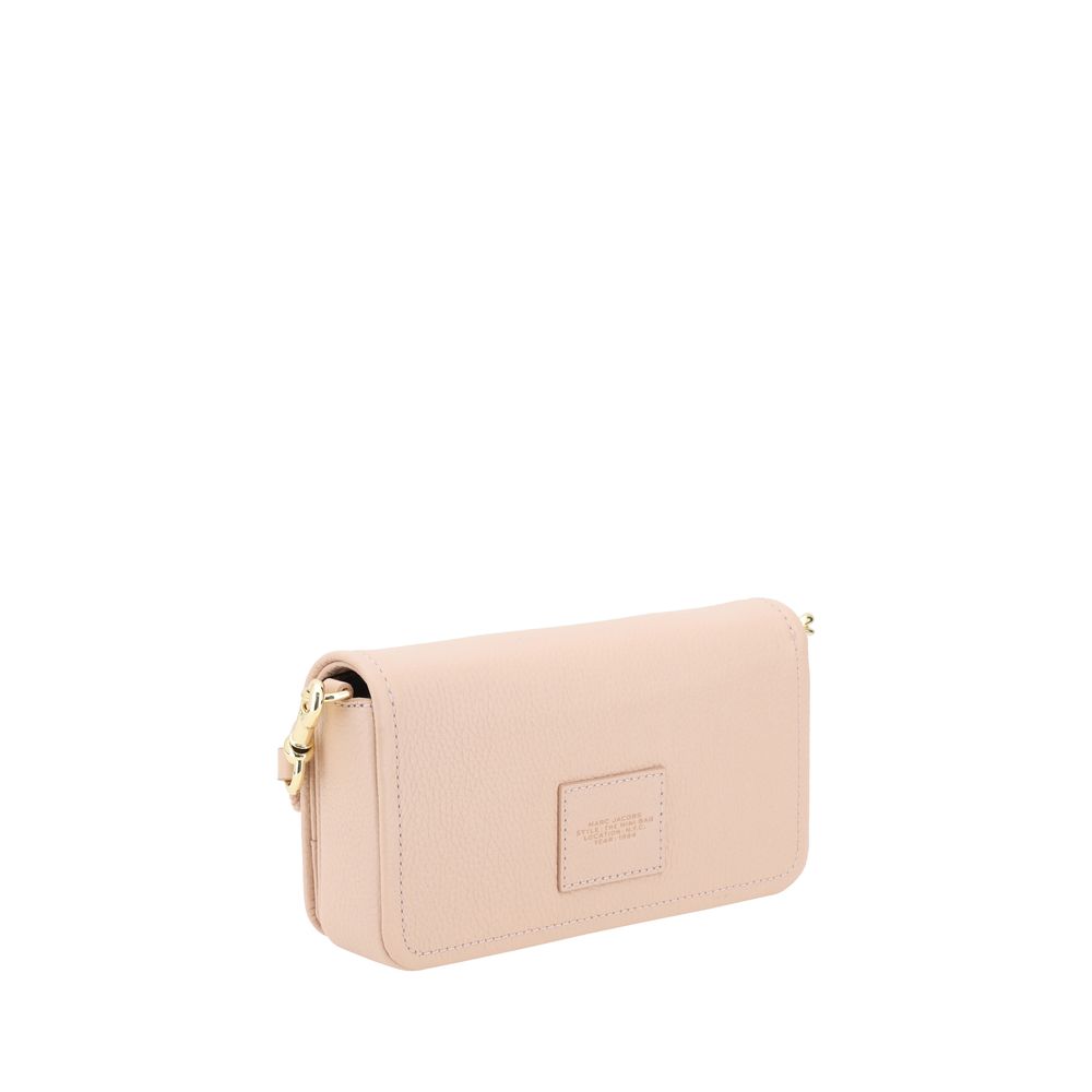 Mini Shoulder Flap Bag by Marc Jacobs for women in bos taurus calf grained leather multicolor & monogram showcases a enviable silhouette, artfully detailed with a secure flap, magnetic & button, organized single-compartment, and versatile shoulder-strap & adjustable-strap for a enviable look.