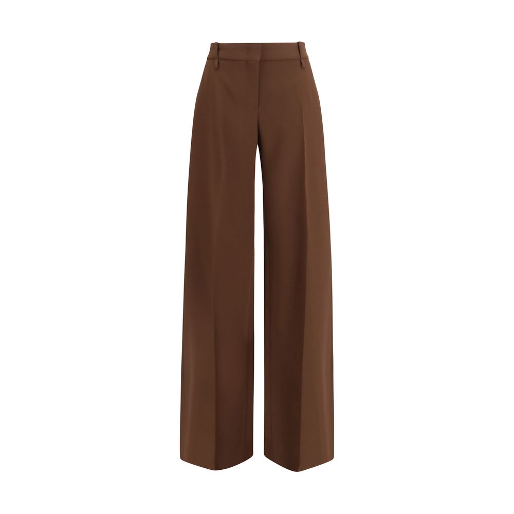 Trousers by Ermanno Scervino for women in viscose & rayon brown presents a perennial silhouette, meticulously tailored with a flared, bootcut & regular-fit cut, long finish, and an elegant .