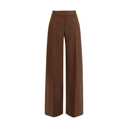 Trousers by Ermanno Scervino for women in viscose & rayon brown presents a perennial silhouette, meticulously tailored with a flared, bootcut & regular-fit cut, long finish, and an elegant .