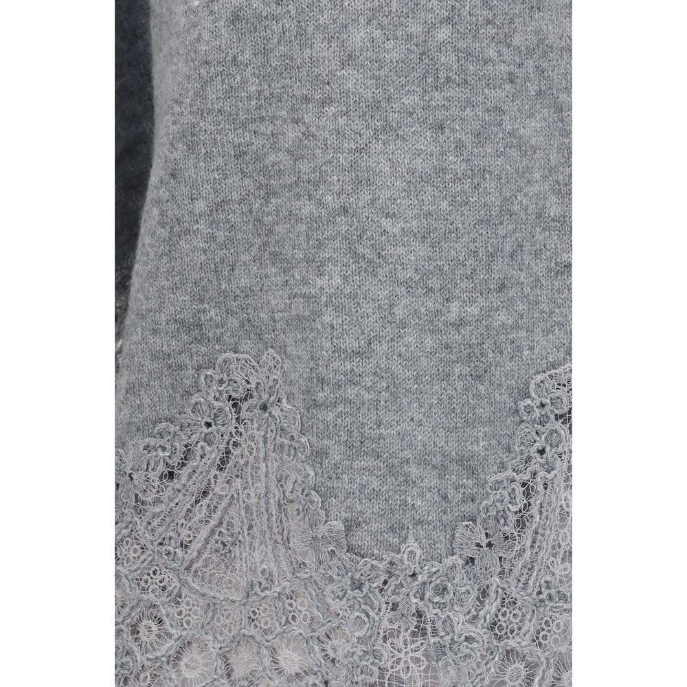This Sweater by Ermanno Scervino for women in cashmere & capra leather gray presents a understated silhouette, featuring a sophisticated and for a understated finish.