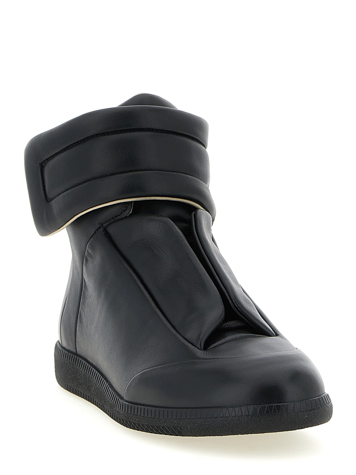 Sneakers by Maison Margiela for men in calfskin leather black & signature presents a sumptuous silhouette, artfully capturing the essence of the Men's Chunky Calfskin Leather Sneakers with its sumptuous chunky style design.