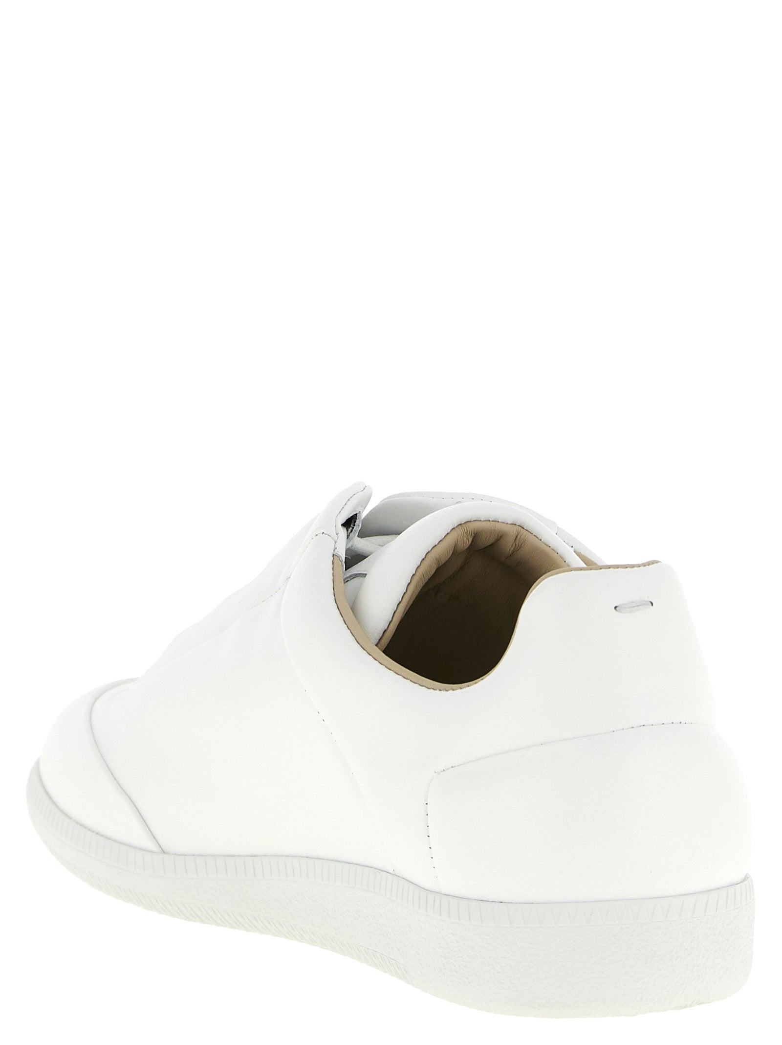 Sneakers by Maison Margiela for men in calfskin leather white & signature presents a impeccable silhouette as Men's Low Top Calfskin Leather Sneakers, expertly defined by a impeccable low-top style for a impeccable, high-fashion look.
