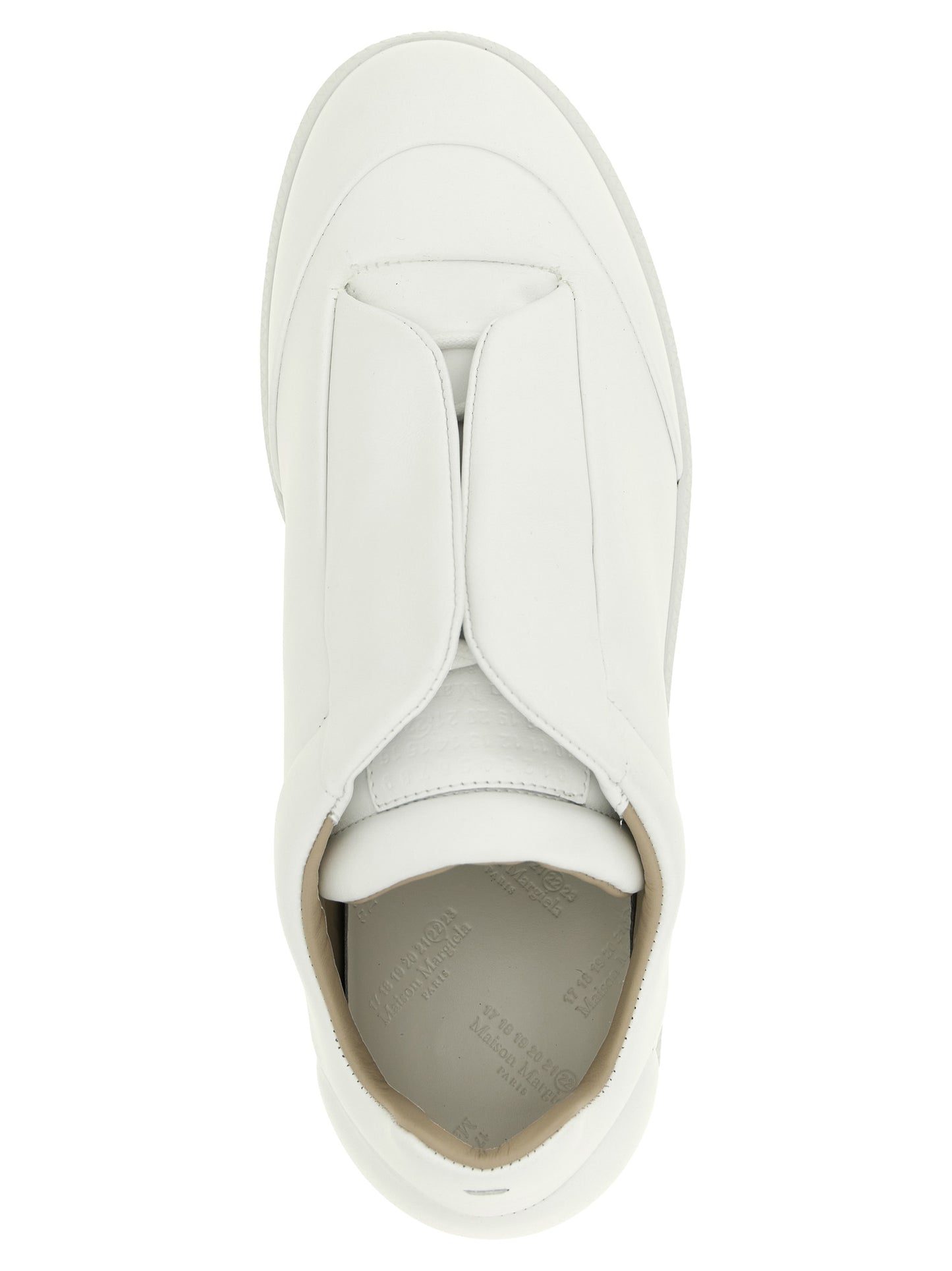 Sneakers by Maison Margiela for men in calfskin leather white & signature presents a sumptuous silhouette, artfully capturing the essence of the Men's Low Top Calfskin Leather Sneakers with its sumptuous low-top style design.