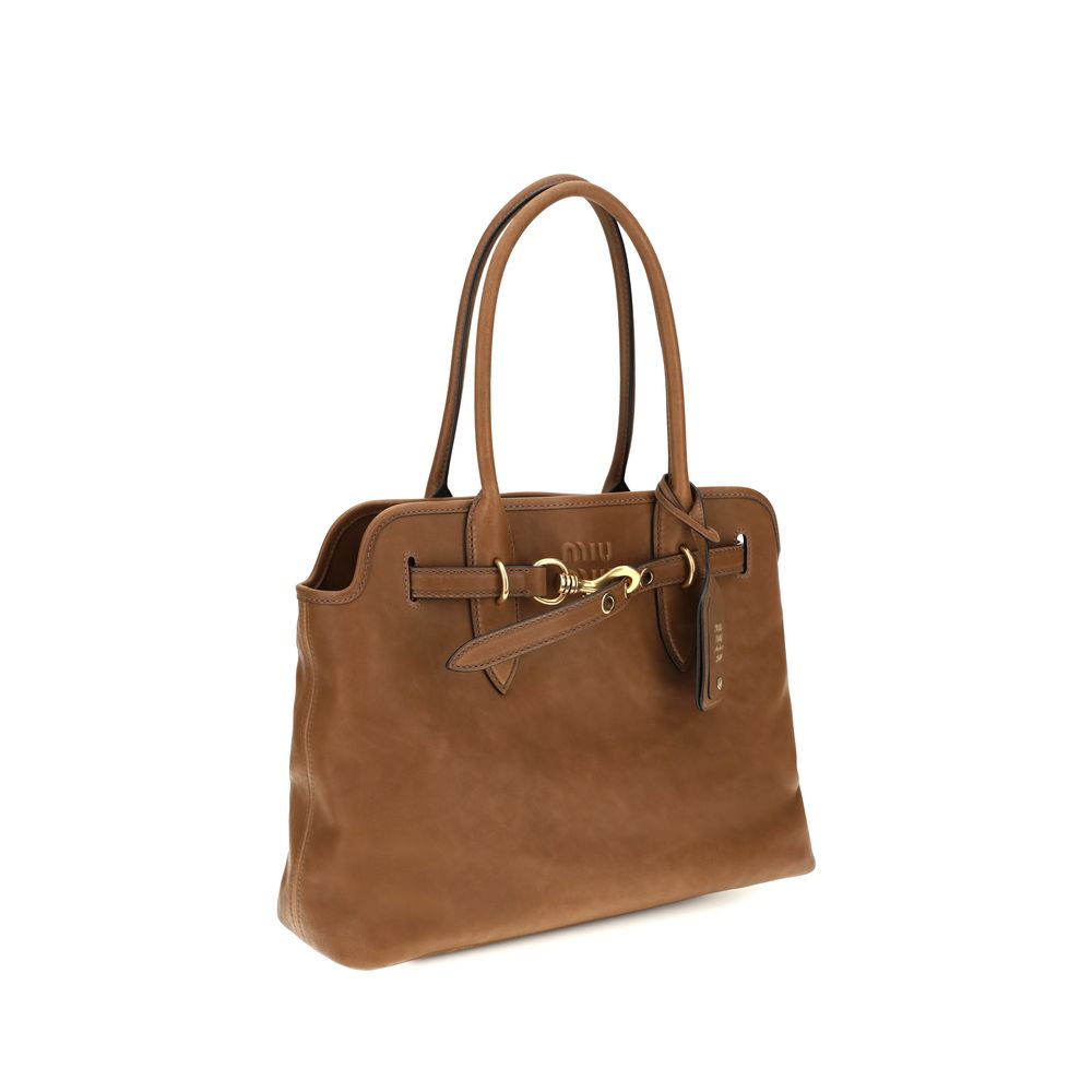 Shoulder Shopper Bag by Miu Miu for women in bos taurus calf leather brown features a effortless chic silhouette with a secure , ample , and versatile shoulder-strap for a effortless chic finish.