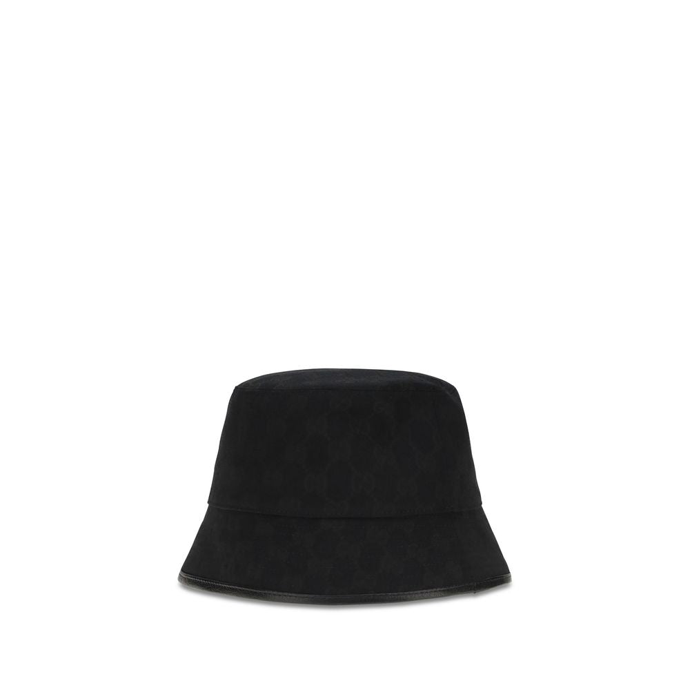 This Bucket Hat by Gucci for women in polyamide polyester leather & cotton canvas black & patterned presents a effortlessly chic silhouette, showcasing the refined aesthetic and effortlessly chic craftsmanship of the Gg Polyamide Polyester Leather & Cotton Canvas Bucket Hat.