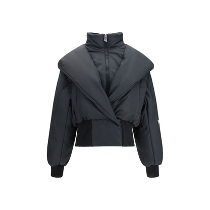 Hooded Puffer Jacket by The Attico for women in polyamide cotton black showcases a bohemian silhouette, artfully detailed with a bohemian hooded shawl-collar neckline and signature pockets, hooded & insulated for a truly bohemian finish.