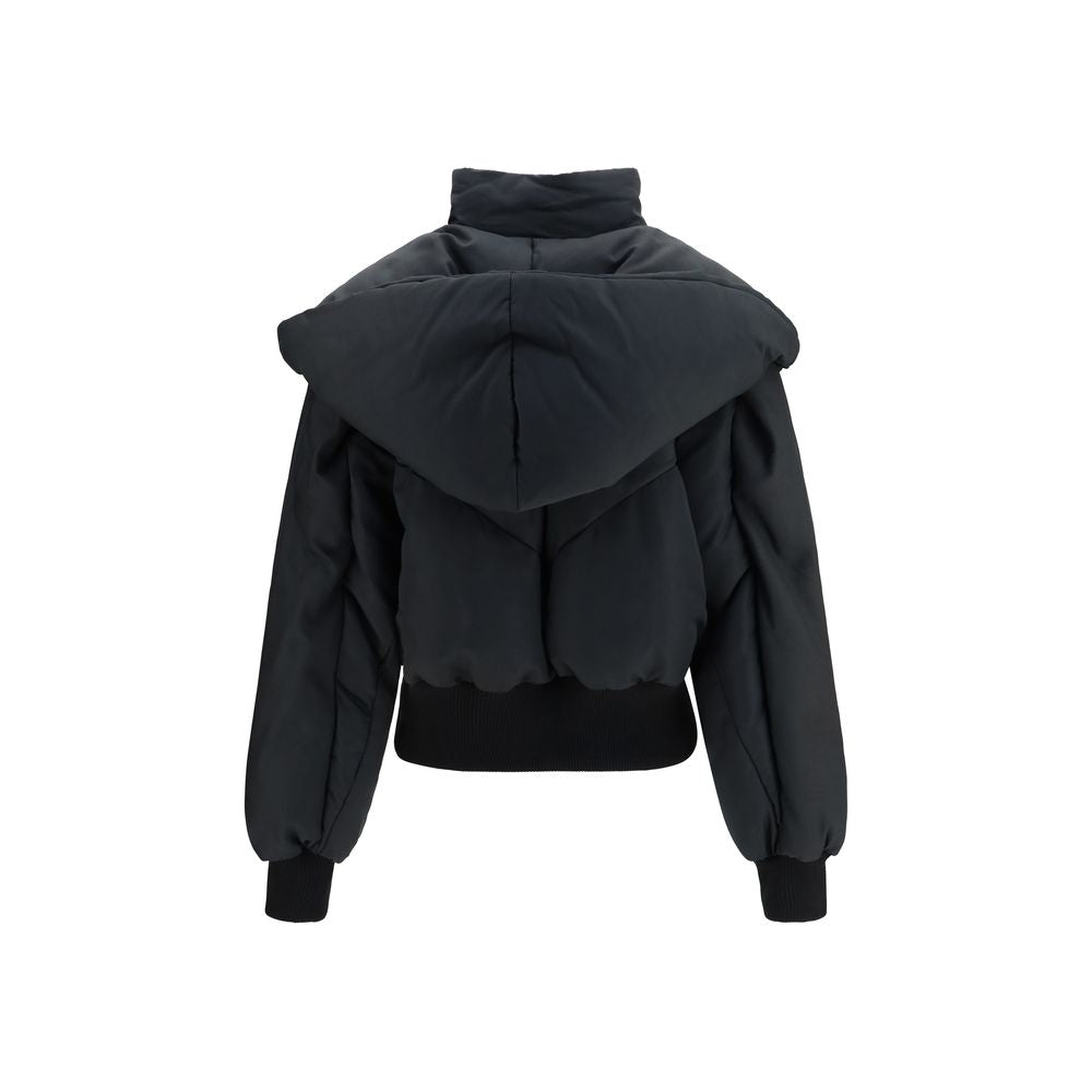 Hooded Puffer Jacket by The Attico for women in polyamide cotton black features a city-ready silhouette, detailed with pockets, hooded & insulated and a city-ready hooded shawl-collar neckline.