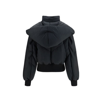 Hooded Puffer Jacket by The Attico for women in polyamide cotton black features a city-ready silhouette, detailed with pockets, hooded & insulated and a city-ready hooded shawl-collar neckline.