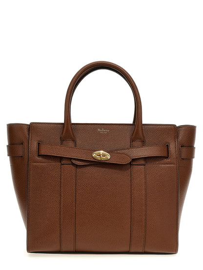 Small Tote Bag by Mulberry for women in leather & metal brown features an utilitarian-chic silhouette, showcasing the Leather & Metal Small Tote Bag design with a secure zipper, ample , and versatile shoulder-strap & handle.