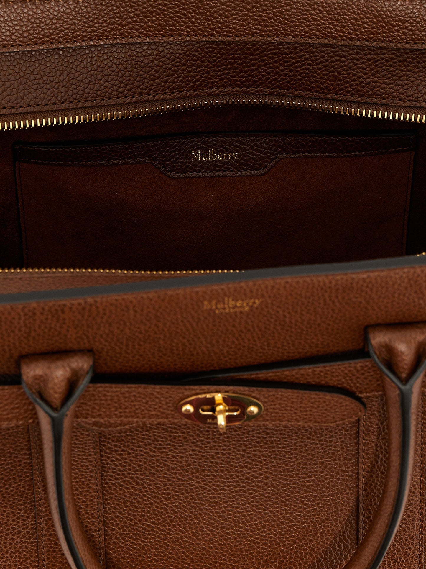 Small Tote Bag by Mulberry for women in leather & metal brown features a urban sophisticate Leather & Metal Small Tote Bag design with a secure zipper, ample , and versatile shoulder-strap & handle for a urban sophisticate finish.