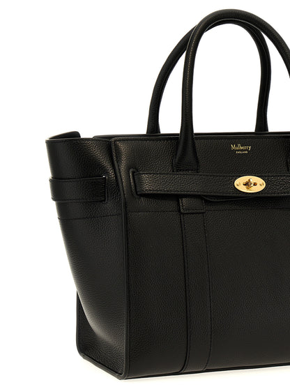Small Tote Bag by Mulberry for women in calfskin leather black features a distinguished Calfskin Leather Small Tote Bag design, complete with a secure , ample , and versatile shoulder-strap & handle for a distinguished look.
