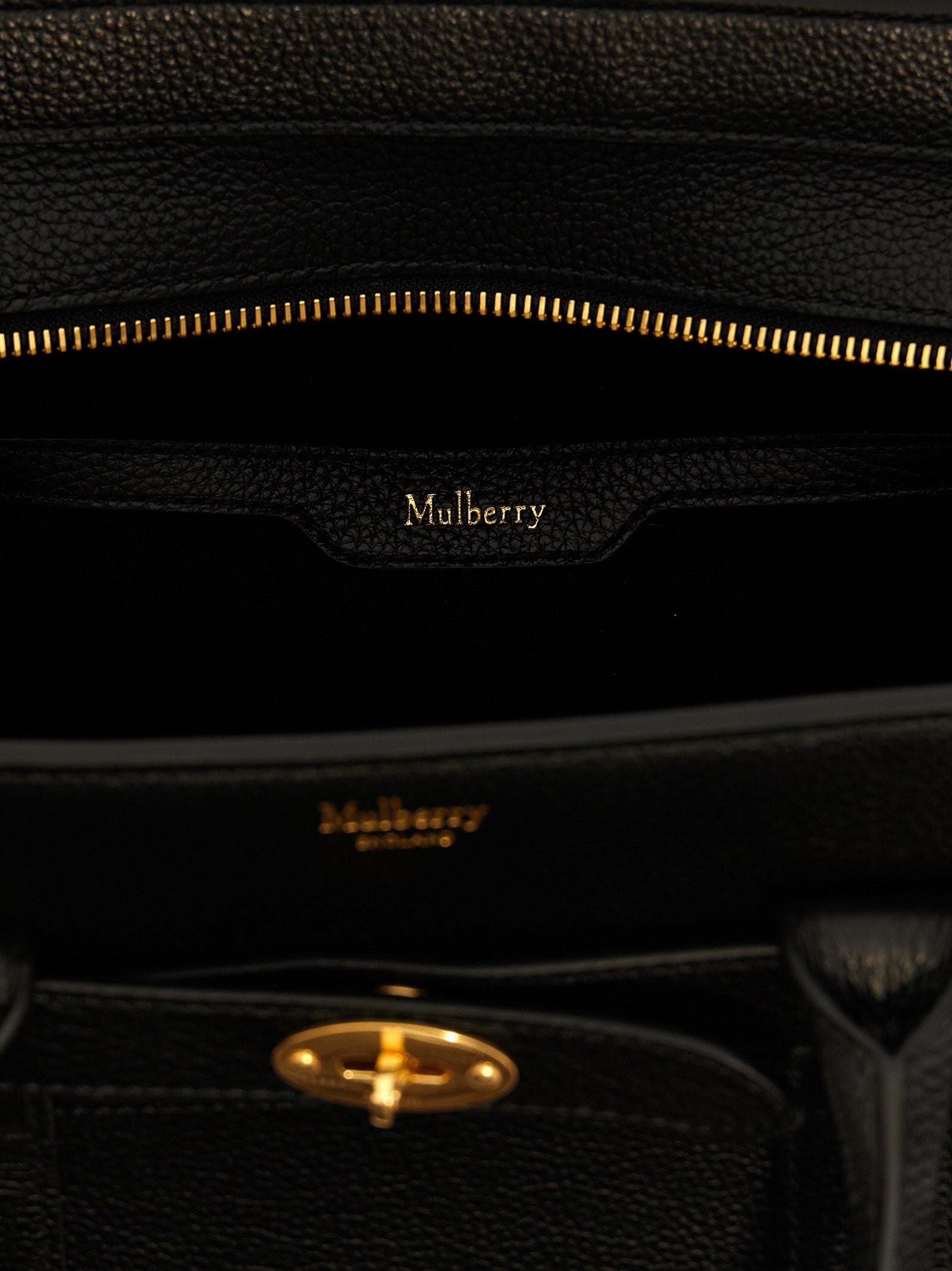Small Tote Bag by Mulberry for women in calfskin leather black features an metropolitan chic Calfskin Leather Small Tote Bag design with a secure , metropolitan chic , and versatile shoulder-strap & handle for a metropolitan chic look.
