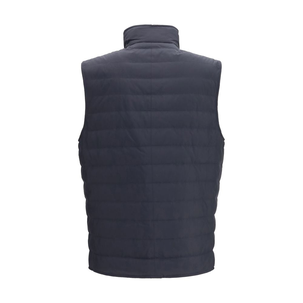Vest by Brunello Cucinelli for men in polyester blue showcases a dynamic silhouette, perfectly balancing pockets & insulated with a dynamic high-collar neckline for a sophisticated, high-fashion look.