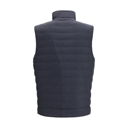 Vest by Brunello Cucinelli for men in polyester blue showcases a dynamic silhouette, perfectly balancing pockets & insulated with a dynamic high-collar neckline for a sophisticated, high-fashion look.