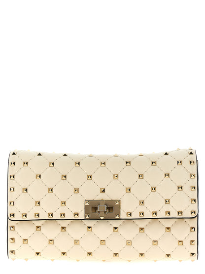 Quilted Shoulder Flap Bag by Valentino Garavani for women in lamb leather white showcases a enviable silhouette, artfully detailed with a secure flap, organized , and versatile shoulder-strap for a enviable look.