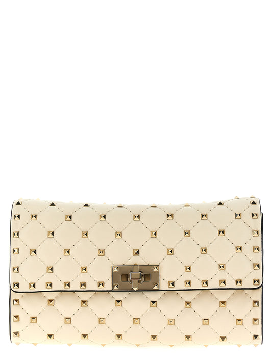 Quilted Shoulder Flap Bag by Valentino Garavani for women in lamb leather white showcases a enviable silhouette, artfully detailed with a secure flap, organized , and versatile shoulder-strap for a enviable look.