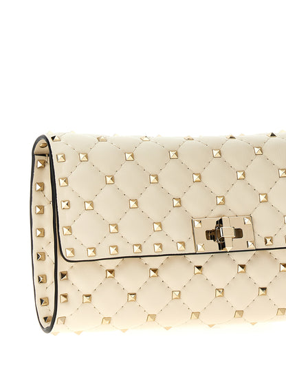 Quilted Shoulder Flap Bag by Valentino Garavani for women in lamb leather white features a effortless chic silhouette with a secure flap, ample , and versatile shoulder-strap for a effortless chic finish.