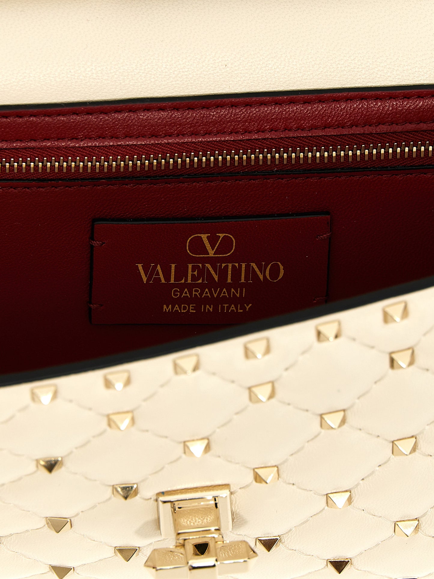 Quilted Shoulder Flap Bag by Valentino Garavani for women in lamb leather white features a distinguished silhouette, showcasing a secure flap and distinguished with versatile shoulder-strap for a distinguished finish.