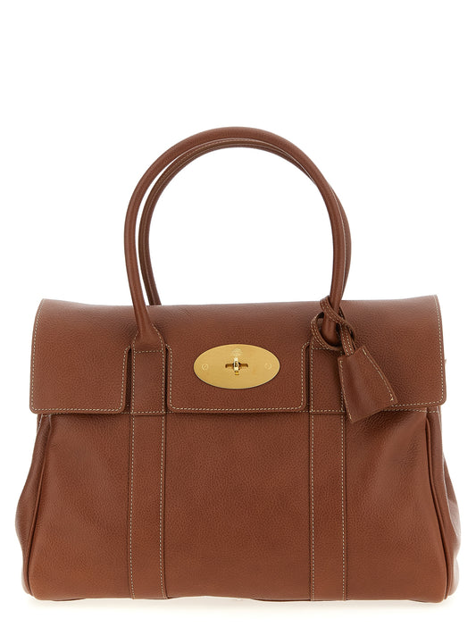 Shoulder Flap Bag by Mulberry for women in calfskin leather brown features an effortlessly chic silhouette with a secure flap, ample , and versatile shoulder-strap, adjustable-strap & handle for effortlessly chic everyday luxury.