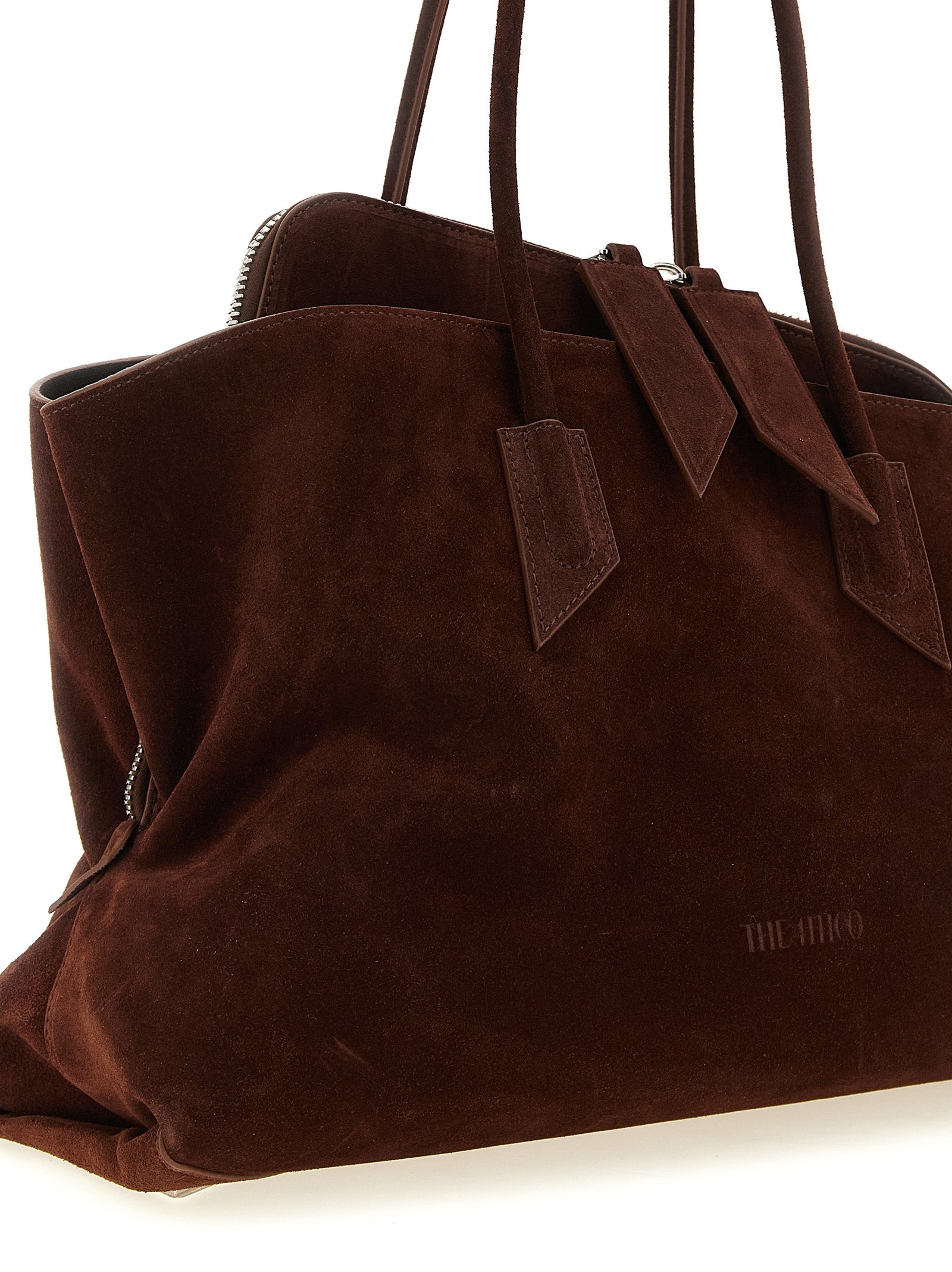 Medium Shoulder Bag by The Attico for women in bos taurus suede leather brown & silver showcases a enviable silhouette, artfully detailed with a secure zipper, organized , and versatile shoulder-strap & handle for a enviable look.