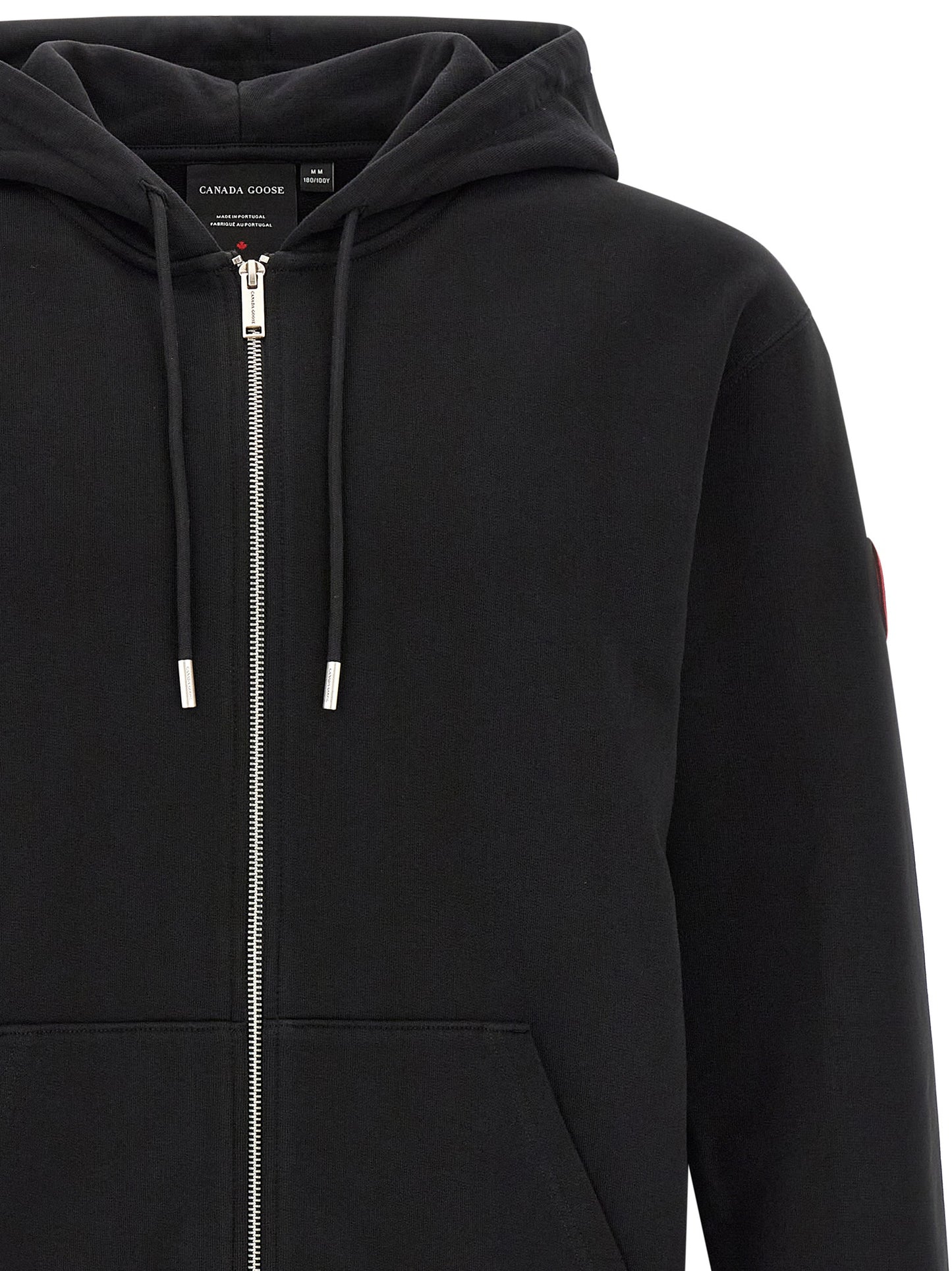Sweatshirt Hoodie by Canada Goose for men in cotton terrycloth black & silver showcases a city-ready silhouette, artfully detailed with a signature hooded split neckline and for a city-ready finish.