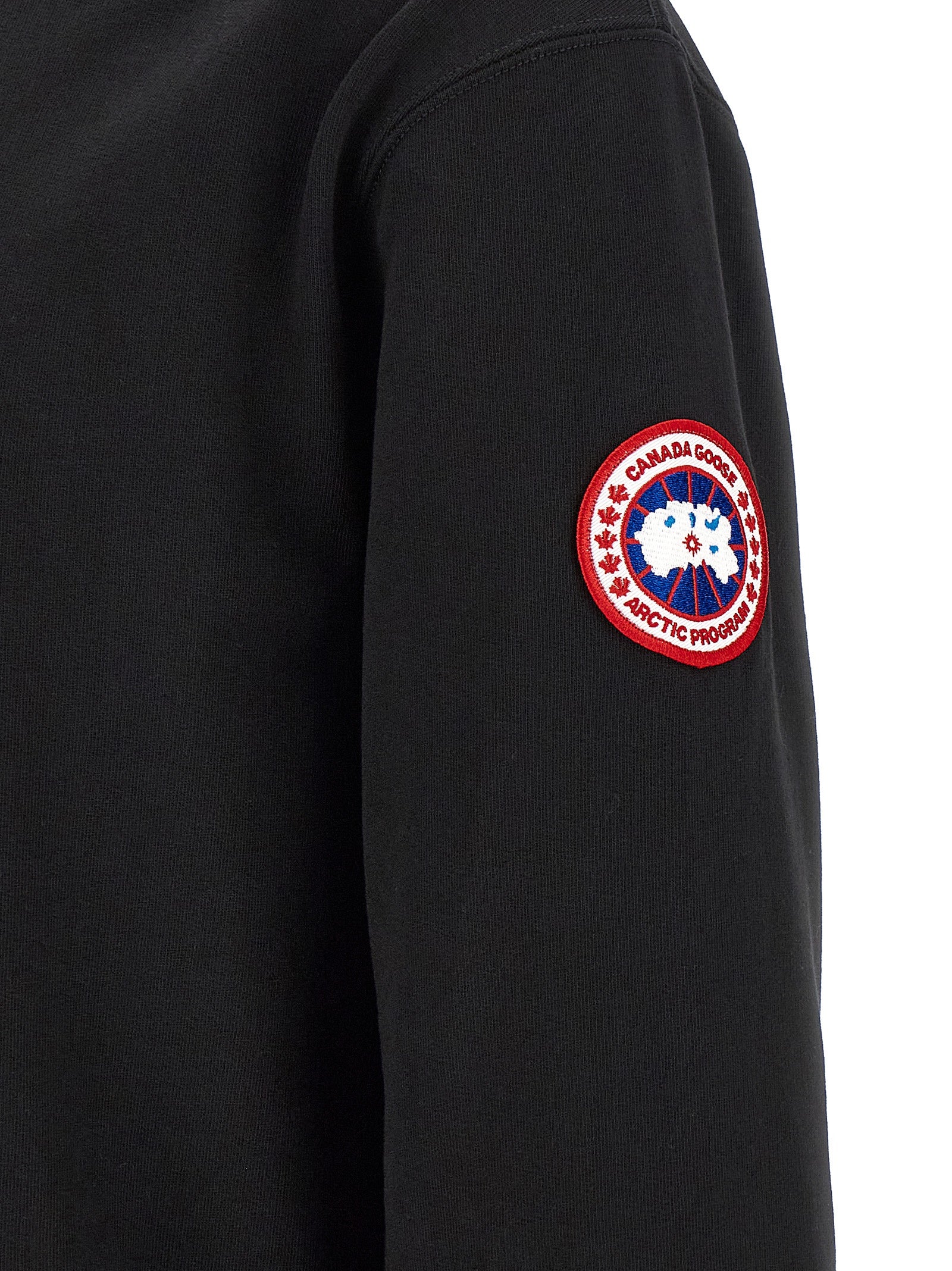 Sweatshirt Hoodie by Canada Goose for men in cotton terrycloth black features a slouchy chic silhouette, detailed with a slouchy chic and a signature for an elevated aesthetic.