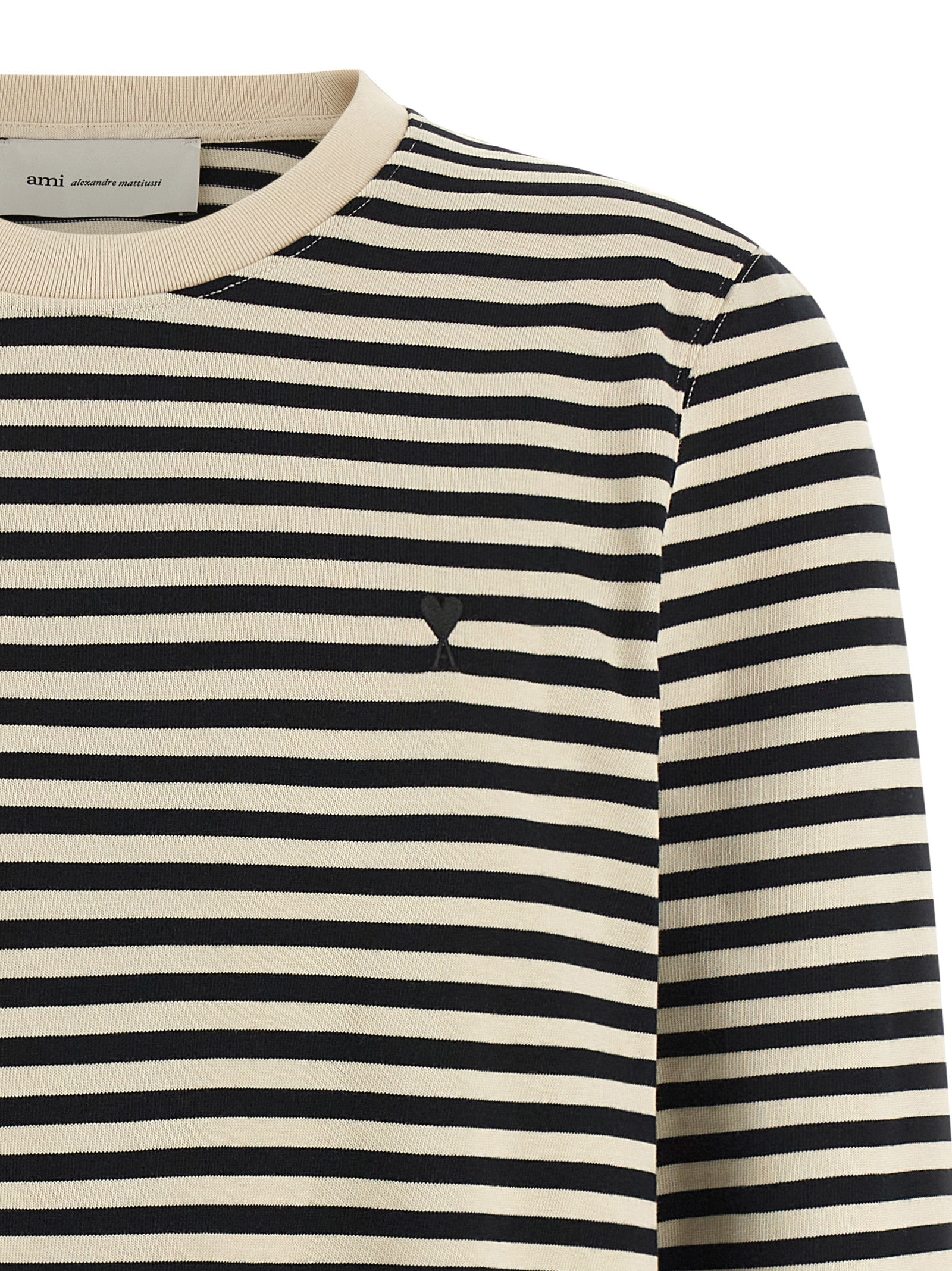 Activewear T-Shirt by Ami Paris for women in organic cotton bicolour, black, white & striped presents a kinetic silhouette, showcasing the kinetic and alongside functional for a premium, athletic look.