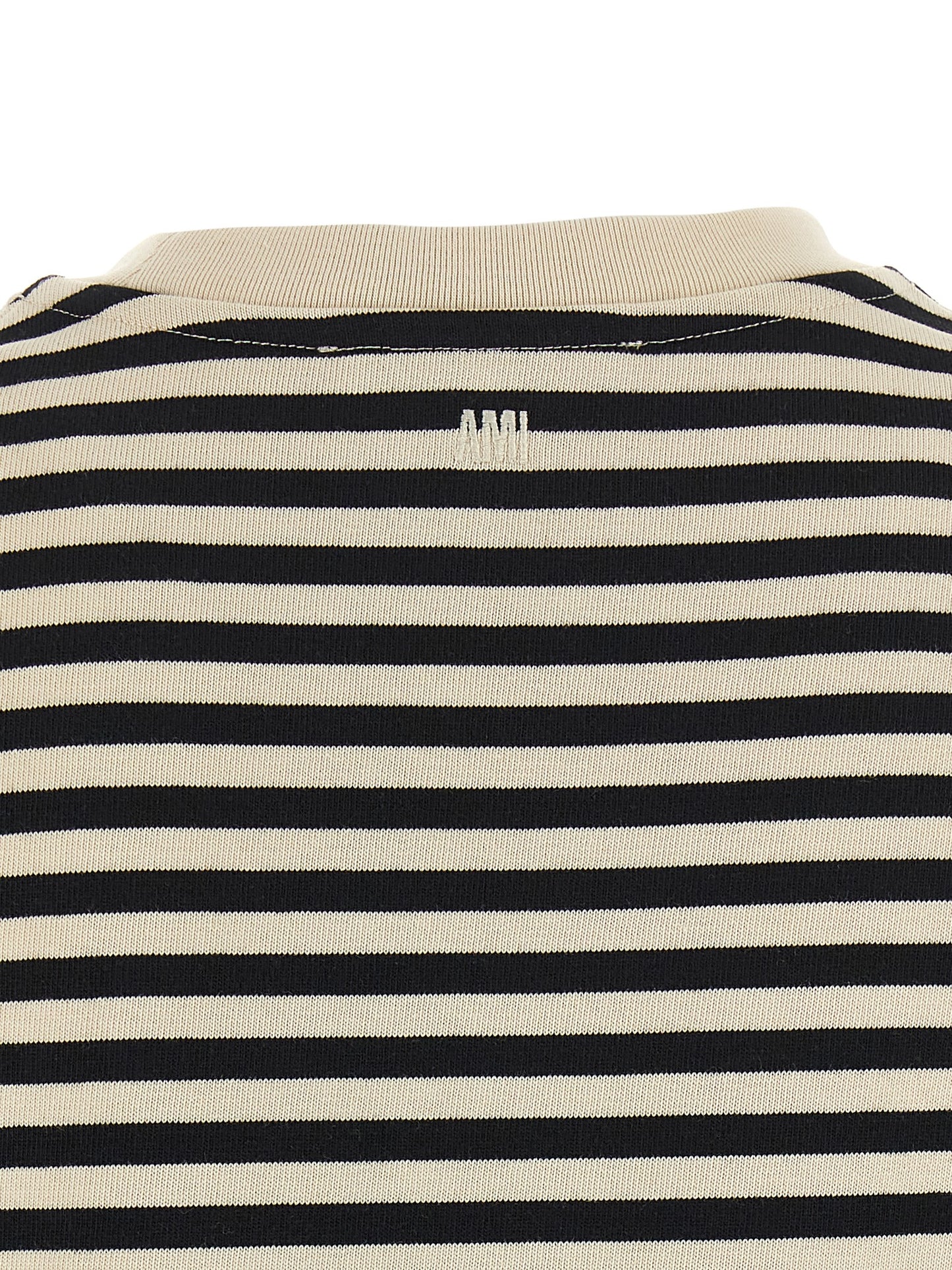 Activewear T-Shirt by Ami Paris for women in organic cotton bicolour, black, white & striped features a dynamic silhouette with and enhanced by functional .