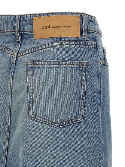 Skirt by Ami Paris for women in denim cotton & nickel blue features an relaxed-yet-refined silhouette that elegantly showcases the Women's Denim Cotton & Nickel Skirt design and sophisticated midi.
