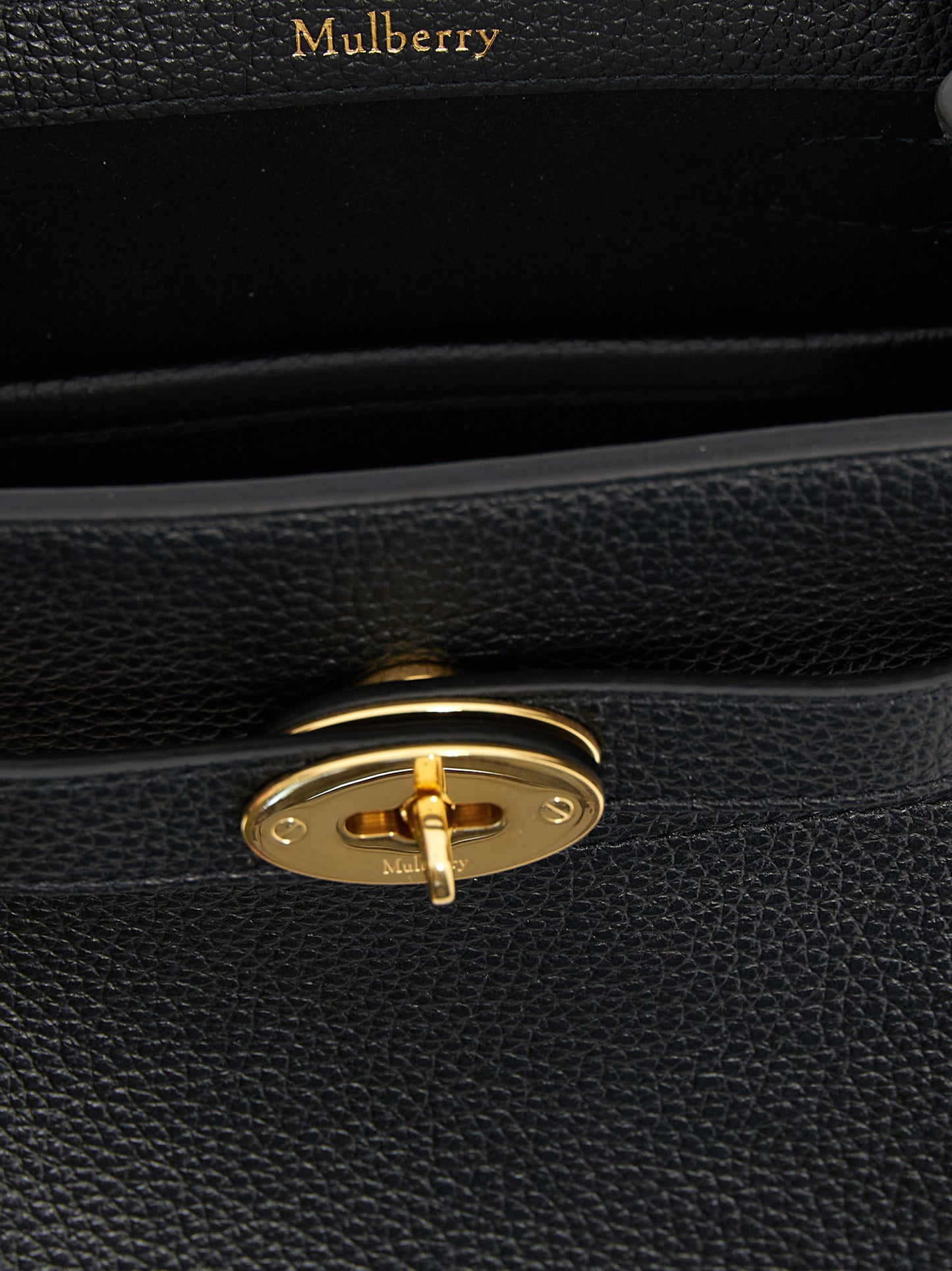 Large Crossbody Bucket Handbag by Mulberry for women in calfskin leather black features a transformative sophistication silhouette, showcasing a secure , ample , and versatile crossbody-strap, shoulder-strap, adjustable-strap, belt-strap & handle for a transformative sophistication look.