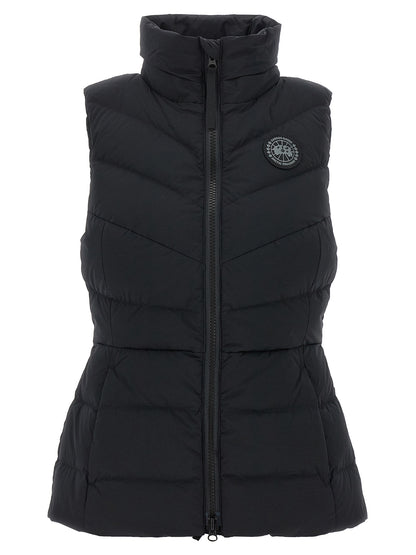 Hooded Vest by Canada Goose for women in polyamide & goose-down black showcases a utilitarian silhouette, artfully incorporating pockets, hooded & insulated and a utilitarian hooded neckline for a truly utilitarian finish.