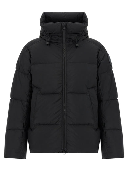 Hooded Overcoat by Canada Goose for men in polyamide & goose-down black showcases a enveloping silhouette, detailed with distinctive windproof, hooded & insulated and a enveloping hooded high-neck neckline.