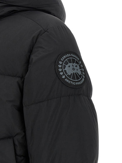 Hooded Overcoat by Canada Goose for men in polyamide & goose-down black features a cosy chic silhouette, artfully detailed with a sophisticated and premium windproof, hooded & insulated for a cosy chic finish.